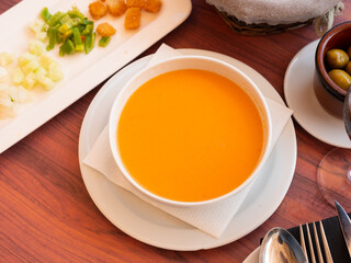 Traditional Spanish dish Gazpacho, made from tomato puree, is served with croutons