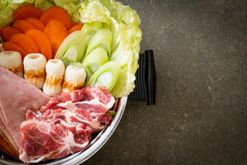 sukiyaki or shabu hot pot black soup with meat raw and vegetable