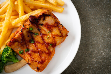 grilled chicken steak with potato chips or french fries