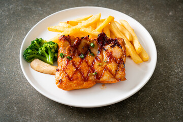 grilled chicken steak with potato chips or french fries