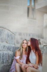 Beautiful girls. Mom and daughter. Sisters on vacation. Rest at the hotel. Holidays. Mom and adult daughter. Vacation. Relax. Cappadocia. Two sisters. The girls are resting. Tenderness. Family. Love.