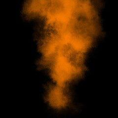 Orange color powder explosion isolated on black background. Royalty high-quality free stock photo image Freeze motion of blue powder exploding. Colorful dust explode. Paint Holi, dust particles splash