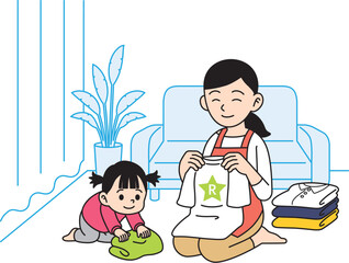 洗濯物をたたむ主婦　お手伝い