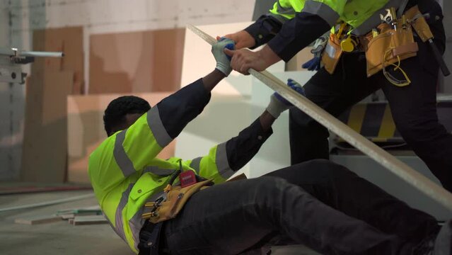 Factory worker having an accident during working.