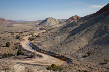 river cutting through desert mountain landscape, central Utah
