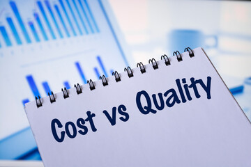Notepad with the inscription Cost vs quality.