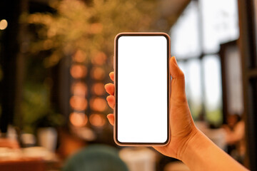 Women's hands holding cell telephone blank copy space screen. smartphone with blank white screen...