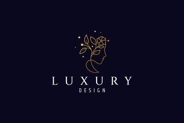 Woman beauty logo in luxury golden color with line art design style