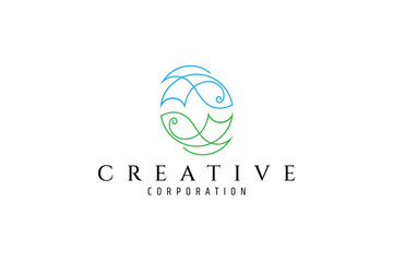 Obraz premium Pair of fish logo with circle shape in green and blue color with one line design style