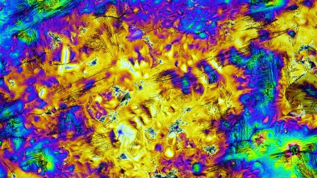 Crystals under a microscope, a solution of Paracetamolum or Acetaminophen and alcohol, the polarization effect allows you to see different color shades.