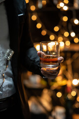 Barman pouring beer glass beautiful night