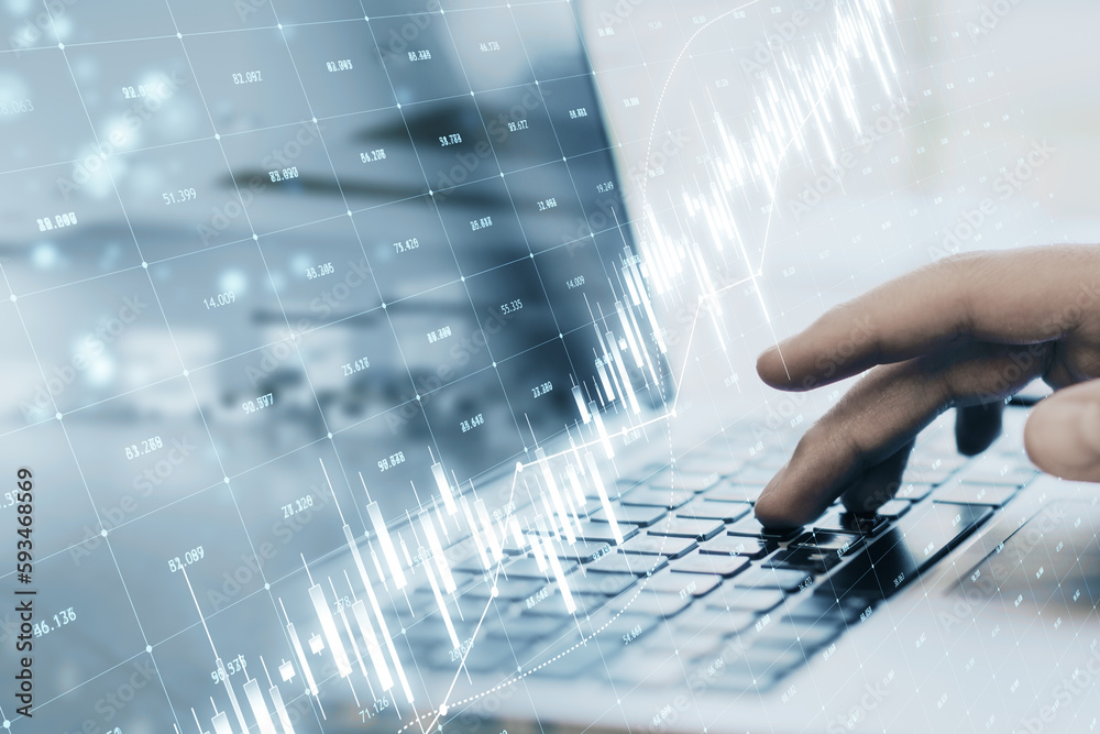 Poster Close up of hands using laptop keyboard with glowing candlestick forex chart and index grid on blurry office background. Trade, finance and market data concept. Double exposure.