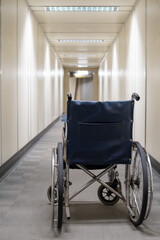 Empty wheelchair in aerobridge, empty wheelchair in walkway, empty wheelchair in airport