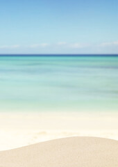 Sea sandy beach background image in summer, bright colors, nice and fresh atmosphere.