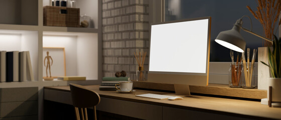 Interior design of modern home workspace at night with computer mockup