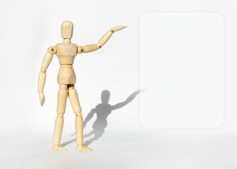 Wooden man on white background shows space for copy and text