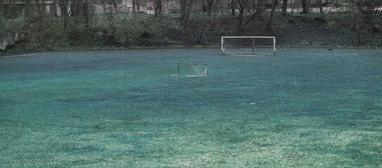 Abandoned football field in rustic area