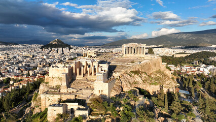 Aerial drone dramatic shot above unique Acropolis hill and the Parthenon an Unesco world heritage site, Athens historic centre, Attica, Greece