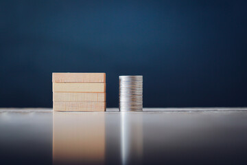 Wooden blocks and coins background for business text