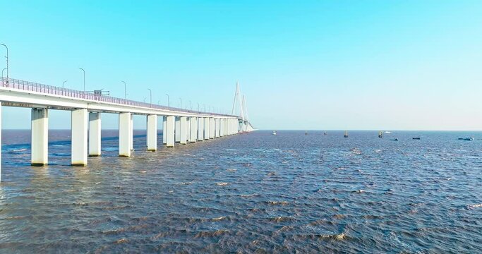 Aerial view of Hangzhou Bay Bridge scenery in Jiaxing, Zhejiang Province, China. The total length of the bridge is 36 kilometers. The design speed is 100 kilometers per hour. 
