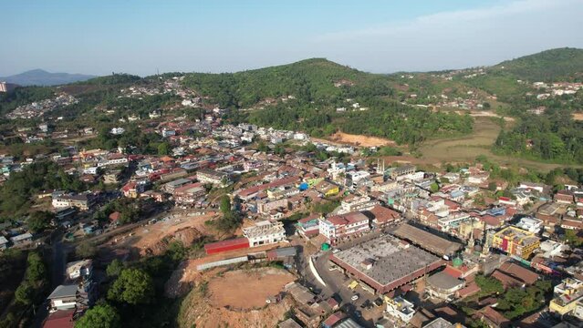 Aerial city view of Madikeri. Madikeri is a hill station town in Madikeri taluk and headquarters of Kodagu district in Karnataka, India.