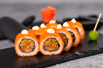 Sushi roll on dark background. Japanese and asian food concept