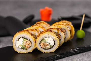 Sushi roll on dark background. Japanese and asian food concept