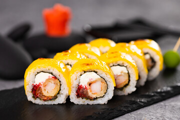 Sushi roll on dark background. Japanese and asian food concept