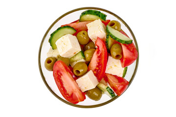 Vegetable salad with feta cheese, tomatoes, isolated on white background. High resolution image.