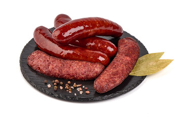 German traditional grilled sausages, close-up, isolated on white background.