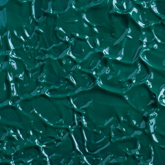 Abstract art background. Spots of paint. Abstract dark green oil painting texture