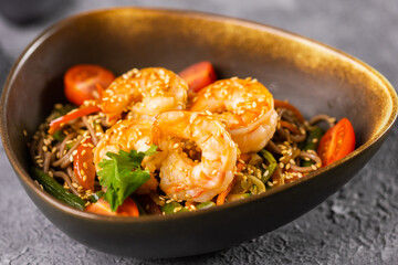 Udon stir-fry noodles with shrimp and vegetables. Asian cuisine