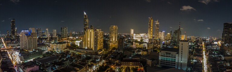 View over the skyline of Bangkok from aerial position at night