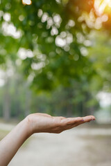 Technology, hand holding with environment Icons over the Network connection on green background.