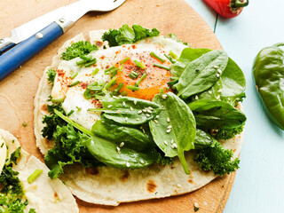 Pitas with eggs and greens