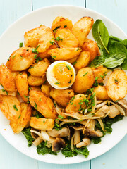 Baked potatoes with mushrooms