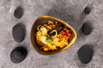 Udon stir-fry noodles with mussels and shrimp. Asian cuisine