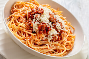 spaghetti al ragu alla Bolognese in white bowl