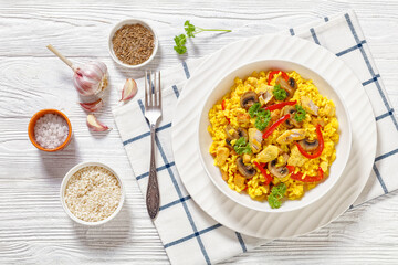 Chicken Paella with mushrooms, red pepper, spices