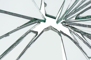 Fototapeta na wymiar Broken pieces glass mirror isolated on white background