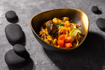 Udon stir-fry noodles with mussels and shrimp. Asian cuisine