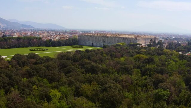 Aerial view of the Royal Palace of Caserta also known as Reggia di Caserta. It is a former royal residence in Caserta, near Naples, Italy. It is the the royal garden of the building.