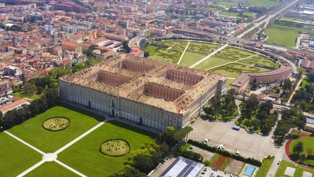 Aerial view of the Royal Palace of Caserta also known as Reggia di Caserta. It is a former royal residence in Caserta, near Naples, Italy. It is the the royal garden of the building.
