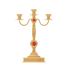 Antique golden candlestick inlaid with precious stones. Old, vintage, antique piece of furniture.