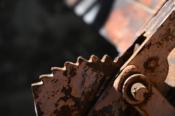 Partial view to an old, rusty handbrake of a tractor in Spain. 