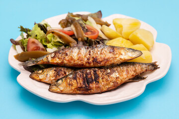 Grilled sardines with boiled potato and fresh salad