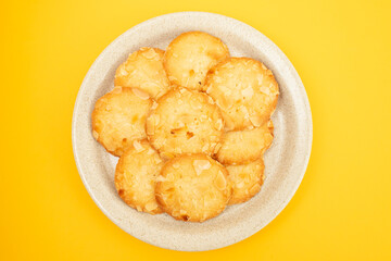 Few homemade cookies with almond on small dish