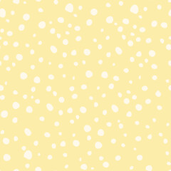 Seamless chaotic  polka dot, pink circles, pattern vector. Yellow background with white polka dots.