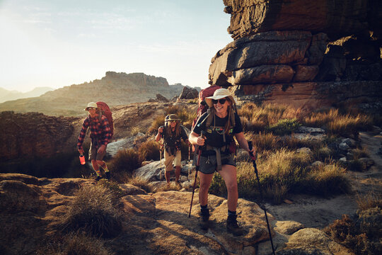 Happy woman hiking with friends on Cederberg Mountain