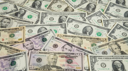 World currency banknote, economic crisis, inflation.U.S. banknotes of various dollar denominations.